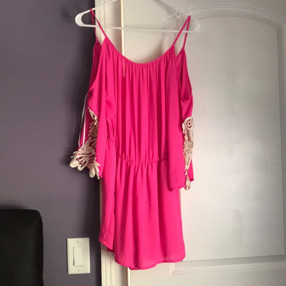 Hot pink romper with white lace sleeves